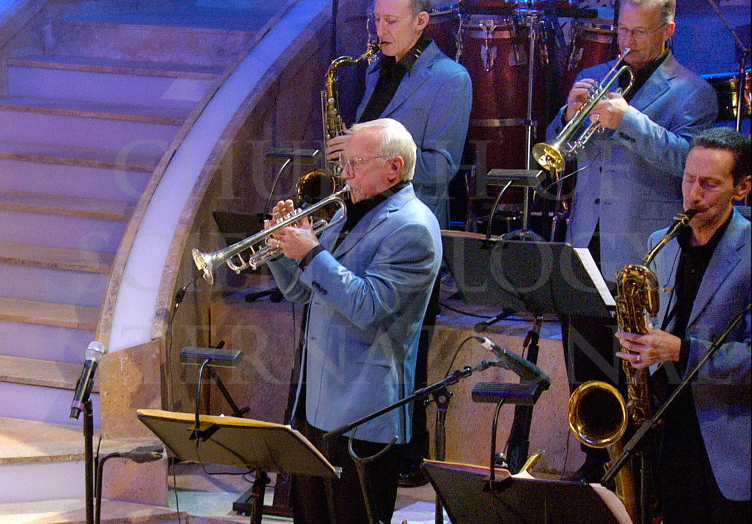 Ron Miscavige on stage playing horn