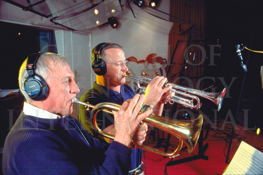 Ron Miscavige in recording studio with horn