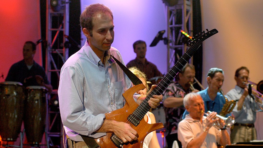 Chris Maio and Ron Miscavige performing on stage