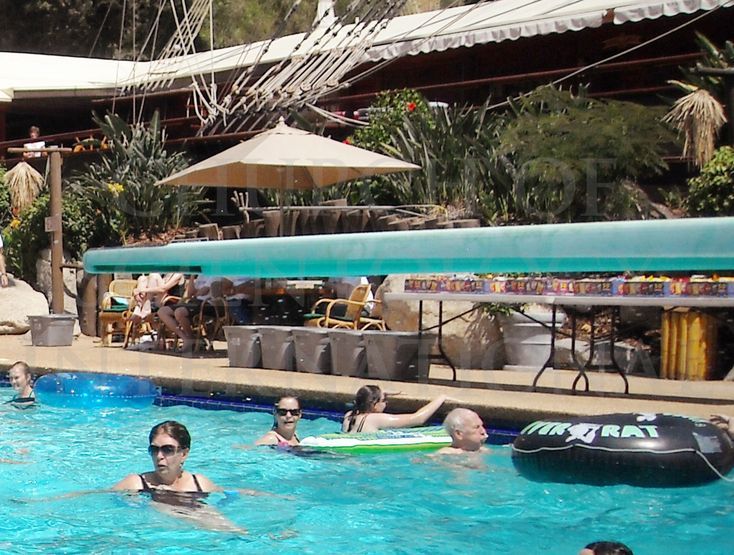 Ron Miscavige enjoying a pool party in the summer of 2009. “Co-author” Dan Koon and Ron write as if the facility is a “prison camp” when it’s a worker’s paradise.